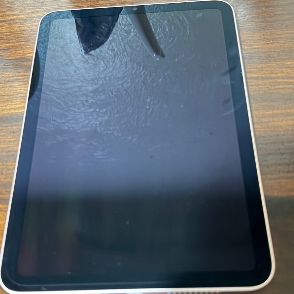 Apple Tablet with Black Display and Silver Frame
